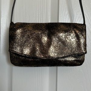 Black and gold shimmery purse